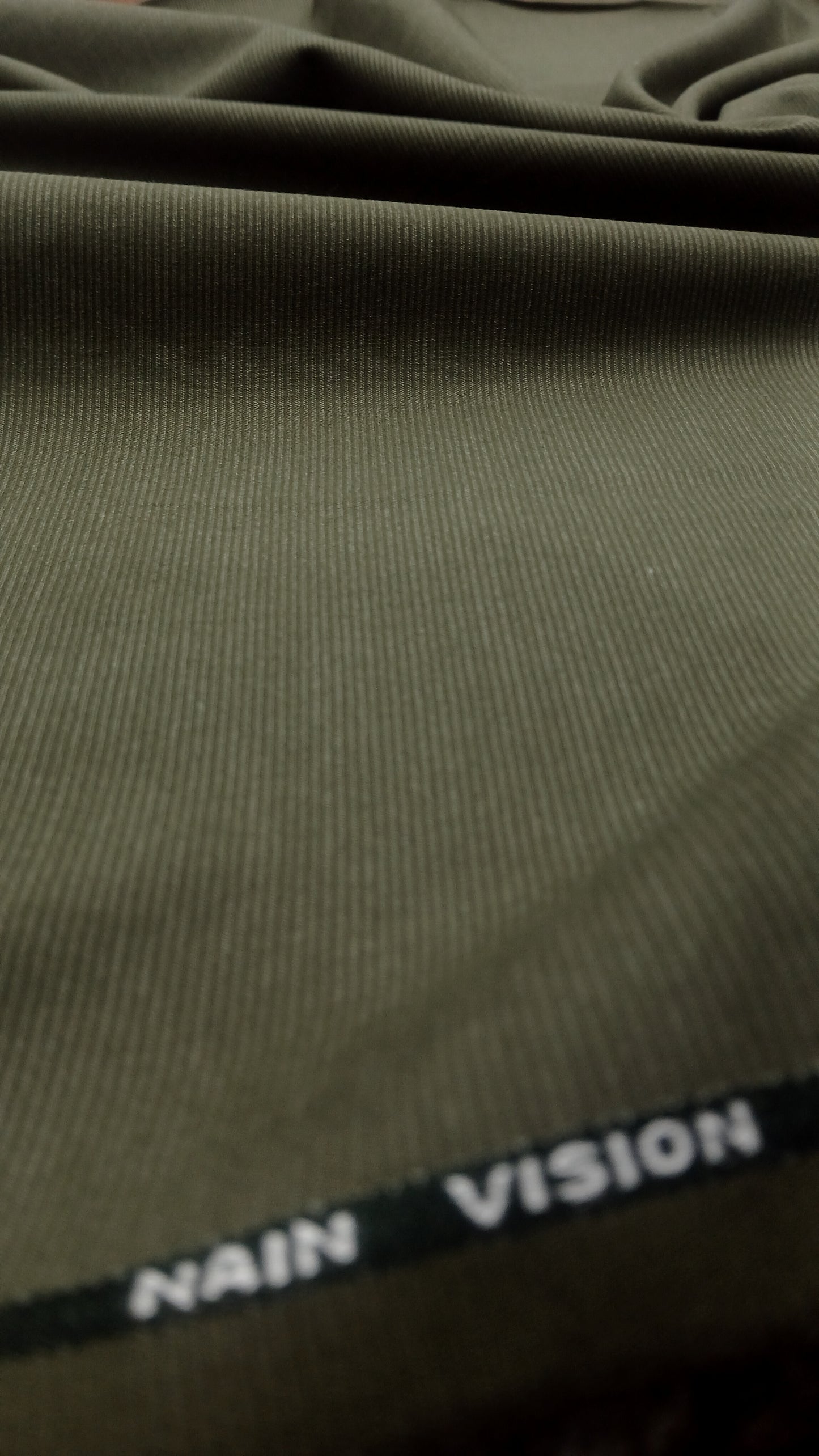 Olive Green Wash & Wear – Premium Mid Winter Self Lining Fabric for Men | Unstitched Men’s Suit Fabric Pakistan